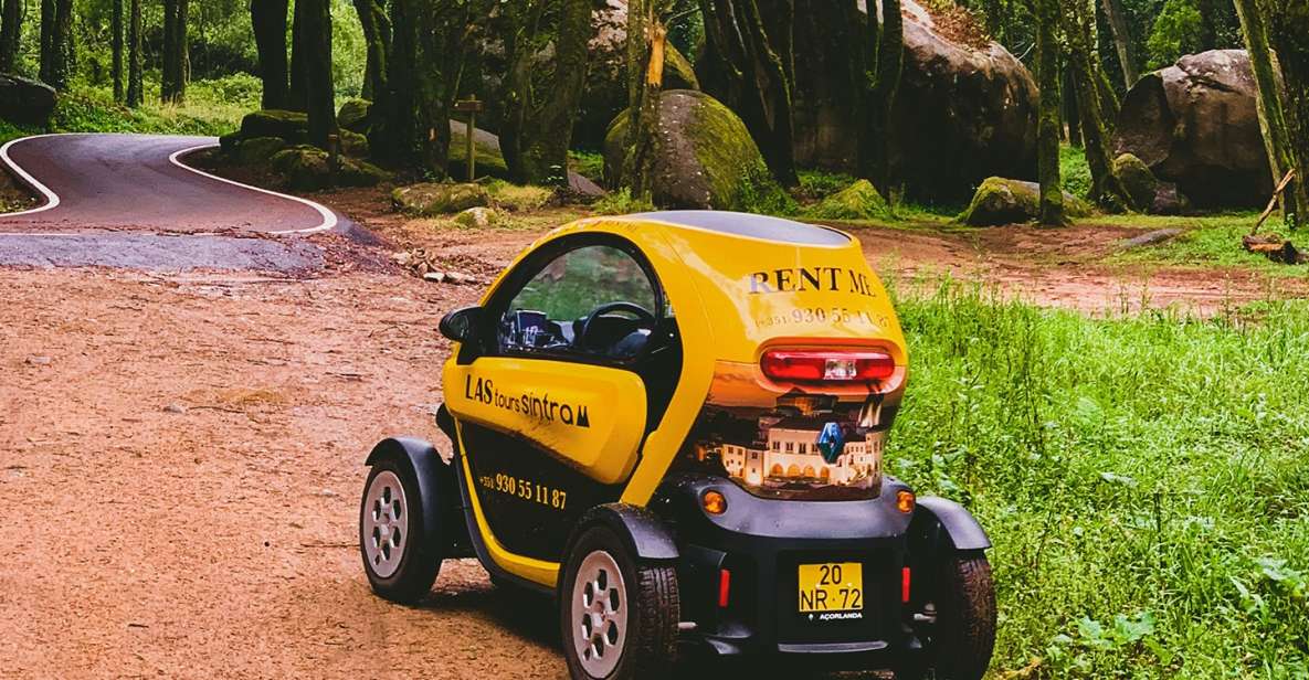 Sintra: 4 MAJOR Monuments Tour E-Car com GPS Audio Guide - Pena Palace: Romantic revivalism from the top of the mountain