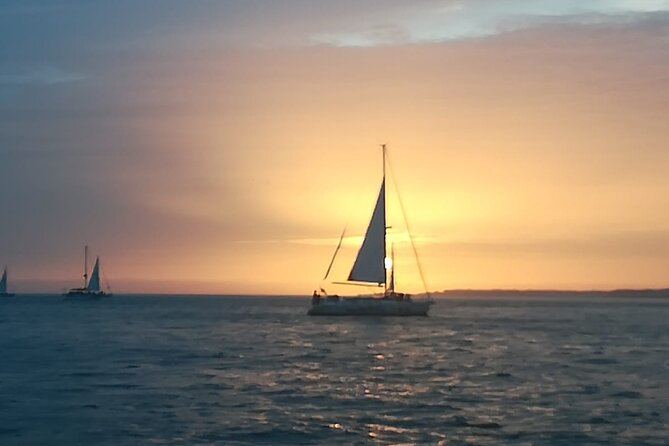 Small Group Sailboat Sunset Tour in Lisbon with a Drink - Torre de Belém and the Monument to the Discoveries: the explorer era, but viewed from water