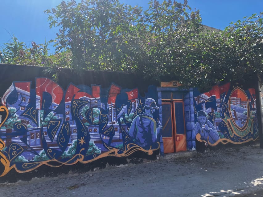 Street Art Lisbon: Tuk Tuk Tour - Graça Historic District: Tiles and Carved Walls on the Way Up