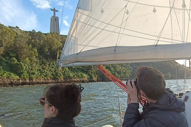Sunset sailing boat trip in Lisbon with snacks - Cais das Colunas to Castelo de São Jorge: old Lisbon rising above the river