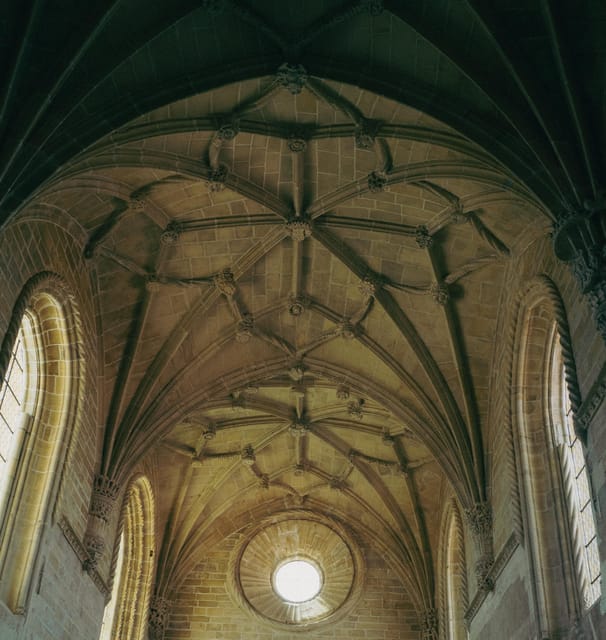Tomar: Knight's Templar Castle and Convent of Christ Tour - The Charola cloister: paintings, symmetry, and why it impresses
