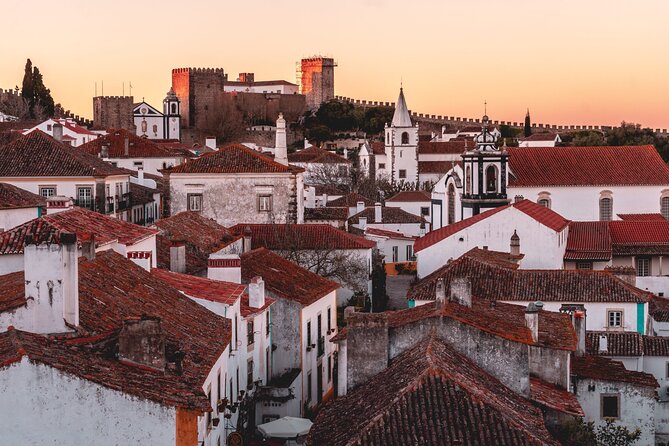 Tour from Lisbon: Obidos, Nazaré and Fátima Small Group - Óbidos: Castle Walls, White Houses, and the Ginja Moment