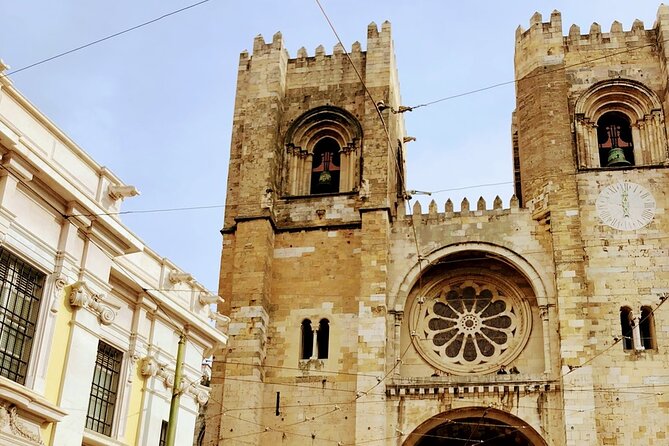 Tour TukTuk 3 hours Lisbon Free Pick-up - The Cathedral Stop: Lisbon’s Oldest Church Marker (But Quick)