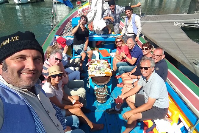Traditional Lisbon Boat Experience - Exclusive - What Happens On Board: Private Hosts, Sailing Fun, and Portuguese Extras