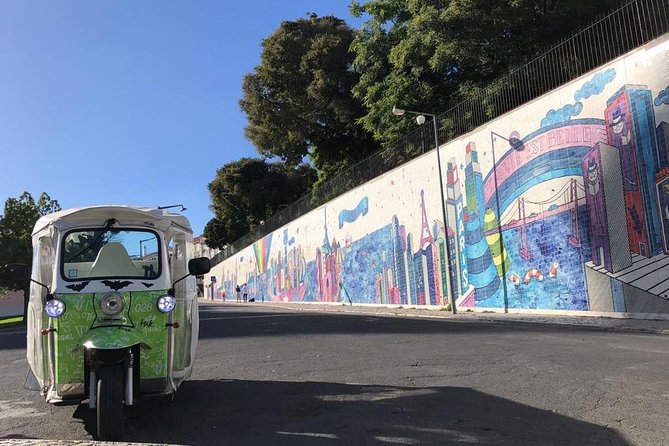Tuk Tuk Lisbon: Exploring Urban Art - Graça and Senhora do Monte: literary faces that turn walls into characters